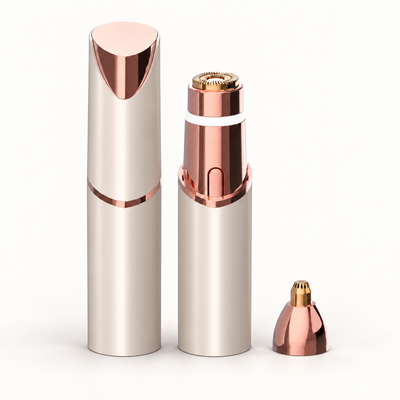 Gold Neluvra 2-in-1 facial trimmer shown capped and uncapped with the round facial head fitted, and the precision attachment beside it.